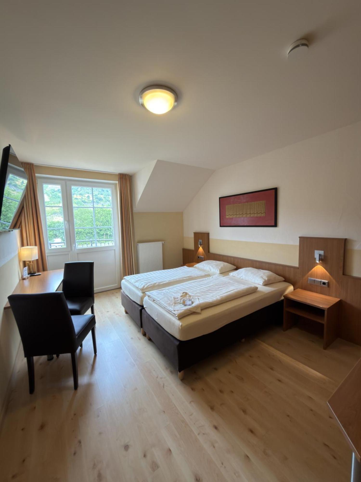 Doppelzimmer mit Balkon
